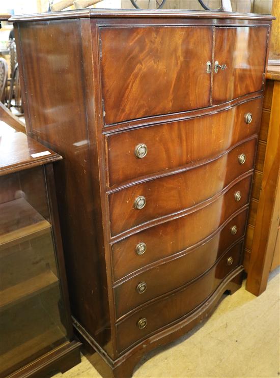 Mahogany serpentine cabinet